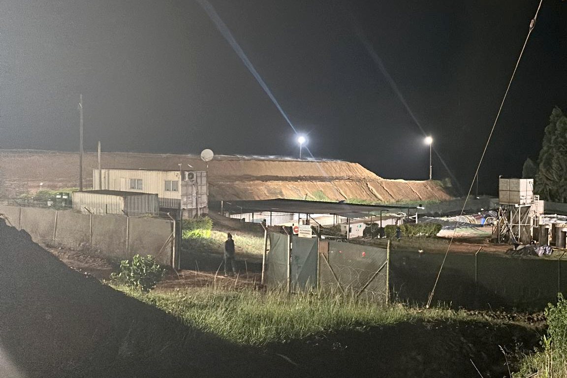 Gold mining operation at night